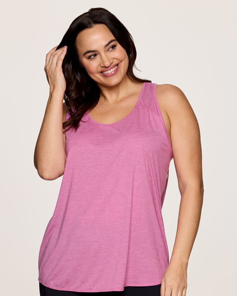 Front of a model wearing a size 3X Prime Relaxed Twist Back Tank Top in Pink Orchid by RBX Active. | dia_product_style_image_id:332830